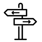 two signs on a post with arrows, one pointing left and one pointing right