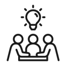 People Chatting Around a Table with a Light Bulb Above